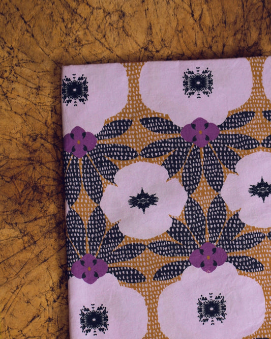 Popeline de coton bio « Orso » – motif floral graphique années 70